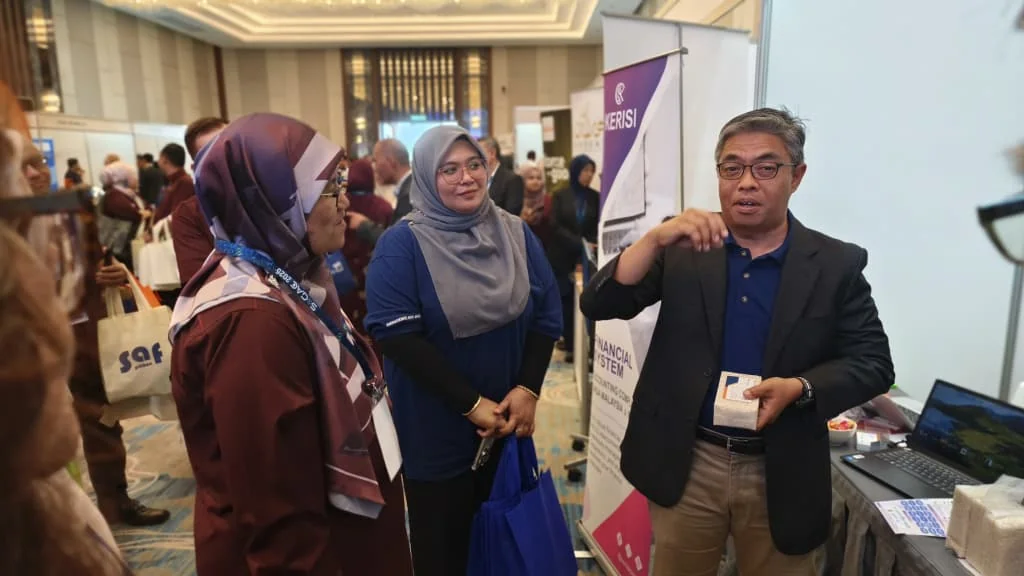 DataScience team presenting KERISI at an exhibition booth